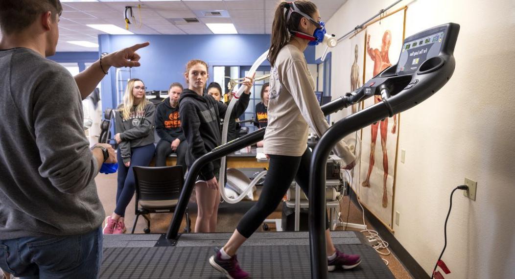 Health and Exercise Sciences students monitor people on treadmills