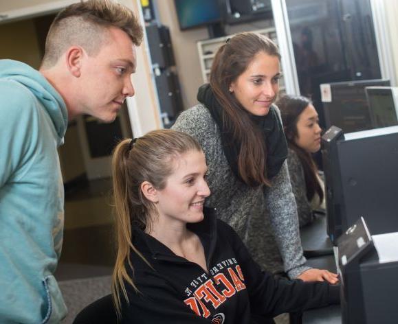 Students in front of computer